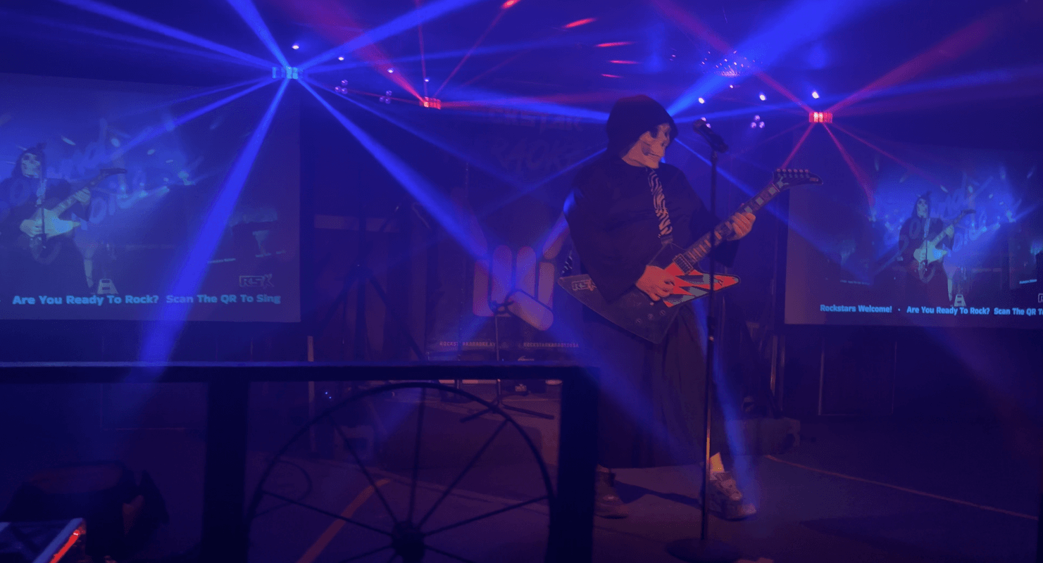 Explorer guitar on stage with light show